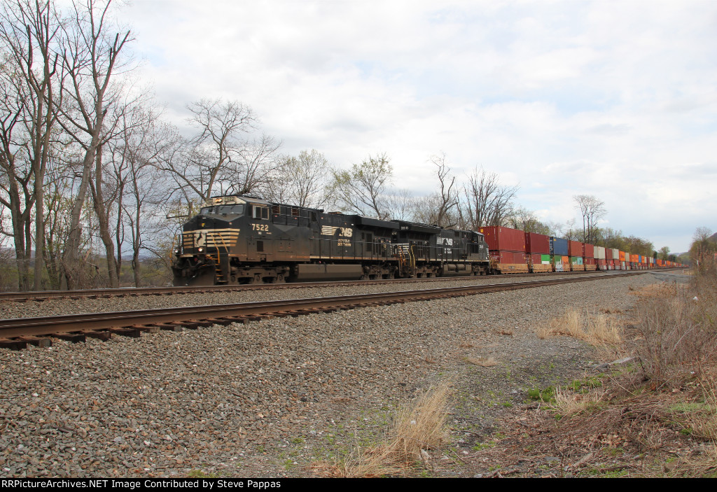 NS 7522 and 3618 take a westbound train through Cove PA